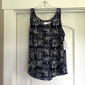 Dark blue with white design sleeveless blouse size L (12-14)